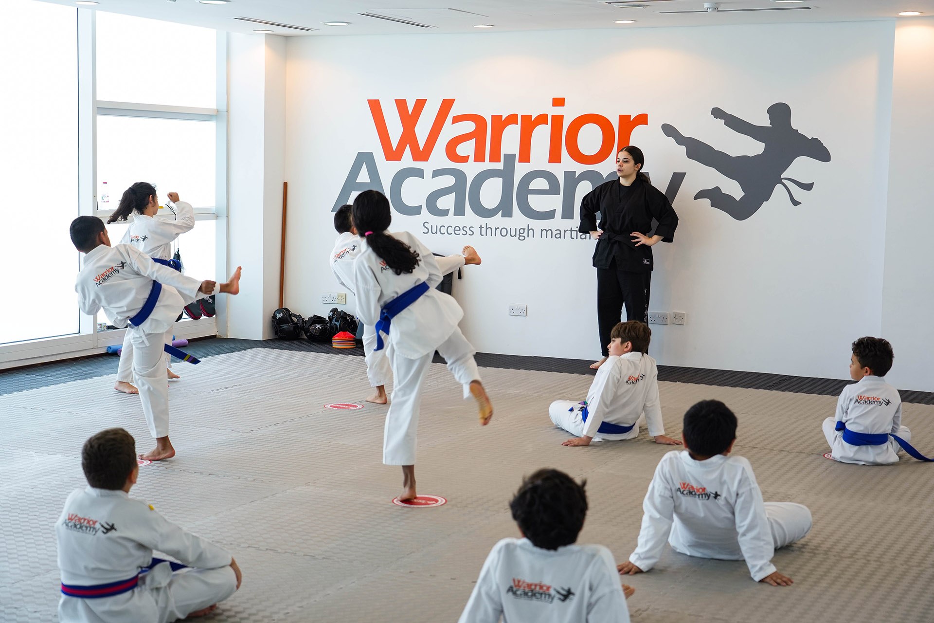 Teen martial arts class in action