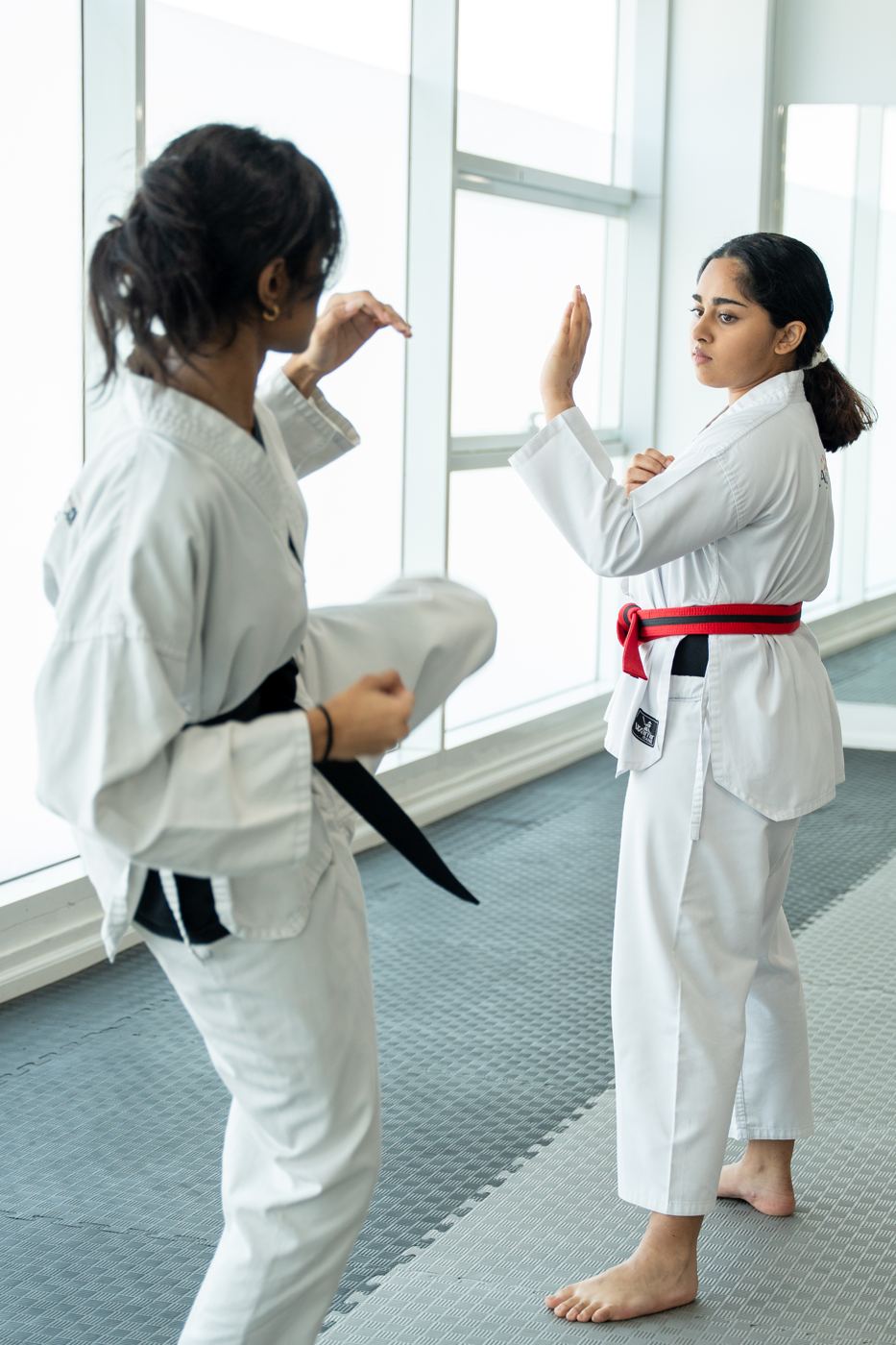 Two students practise a technique together